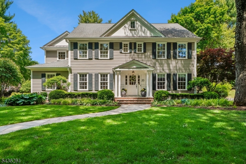 Tucked into a quiet street in the highly sought-after Rolling Hill neighborhood, this stunning Colonial sits on over a half acre of lush, level property and blends timeless elegance with exceptional modern design across FOUR finished levels. At the heart of the home is a beautifully appointed gourmet kitchen featuring a 6-burner Wolf range, Sub-Zero fridge, and an oversized marble center island with seating for six. The adjacent family room showcases custom wood detailing, a coffered ceiling, gas fireplace, and a pair of French doors that open to a spectacular outdoor living space. A formal living room, dining room, private office/den with custom built-ins, mudroom with built-in storage and bench seating, and a three-car garage complete the first level. Upstairs, the recently renovated primary suite features a dramatic vaulted ceiling and updated spa-like en-suite bath. Four additional en-suite bedrooms and a convenient laundry room complete the second floor. The third level, with half bath, offers a versatile bonus/flex space. The fully finished lower level features a media room with gas fireplace, rec space, home gym, full bath and generous storage. Outdoors, the fully fenced expansive and level backyard retreat delivers true resort-style living with a chef-inspired kitchen, complete with BBQ grill, dual refrigerators, outdoor lounge with stone fireplace and mounted TV, set on an oversized bluestone patio. High-end Savant sound system throughout and full house generator.