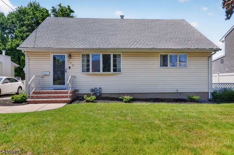Beautiful Cape Cod style home featuring an updated kitchen and a convenient first floor primary bedroom. Offering 4 bedrooms and 2 full baths, this home provides plenty of space for everyday living and entertaining. Gleaming hardwood floors and an updated first floor bathroom add to its charm and appeal. The unfinished basement boasts high ceilings and offers endless potential for future living space. Enjoy the private backyard complete with a cozy deck, perfect for relaxing or hosting gatherings. Nestled in a quiet neighborhood, this move in ready home is ready for you to unpack and enjoy!