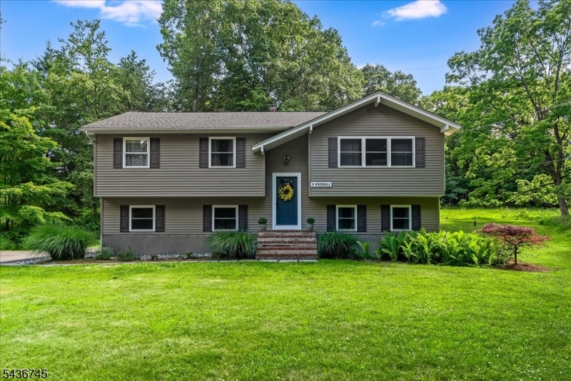 Set on a beautiful 1.84-acre property, 9 Wehrli Road offers the perfect combination of comfort, space, and privacy. Completely renovated in 2026, this inviting 4-bedroom, 2-bath home has been thoughtfully refreshed from top to bottom, creating a warm and welcoming place to call home.At the heart of the home is a stunning new kitchen that's perfect for everything from quiet mornings with a cup of coffee to hosting friends and loved ones. Beautifully updated bathrooms, stylish finishes, and sun-filled living spaces create an inviting atmosphere that's ideal for both everyday living and entertaining.The flexible floor plan offers room for every stage of life, including a lower level featuring an additional bedroom, full bath, and living area perfect for overnight guests, a private home office, a recreation room, or a personal retreat.Situated on 1.84 acres, the property offers the privacy and space you've been searching for while still being conveniently located near schools, shopping, dining, and major commuting routes. Whether you're enjoying a peaceful evening outdoors, gardening, or entertaining on the property, you'll appreciate the tranquility and versatility this home provides.  Located in the highly sought-after Long Valley community, 9 Wehrli Road is a rare opportunity to own a beautifully renovated home in one of Morris County's most desirable locations.