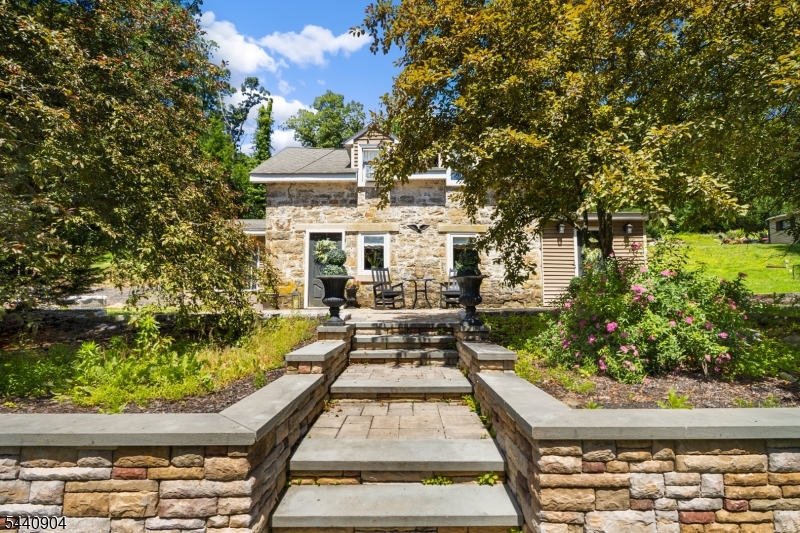 Unique 1814 stone Colonial known as the Moses Sayre Sr. House, offering a rare blend of historic charm and business opportunity. Situated on 3.3 picturesque acres, this 2-bedroom home features a cozy family room with exposed stone walls, rustic wood beams, and timeless character throughout. The property was an established kennel, grooming, and dog training business with a separate building containing 40 runs. Located on a visible county road with approximately 230 feet of road frontage, the property offers excellent exposure and accessibility. Whether you're looking to preserve a piece of history, expand an existing business, or enjoy the convenience of living where you work, this unique property presents an exceptional opportunity.