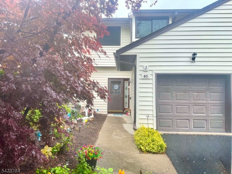 Come live in desirable HAMPTON COMMONS! Conveniently located close to Newton town is this spectacular, CLEAN 2 bedroom, 2 bathroom multi-floor townhome WITH BASEMENT! Step into the foyer where you will discover updated flooring that flows to gorgeously redone kitchen with white cabinets and granite countertops. Newer appliances. The dining room opens to the oversized living room with CATHEDRAL ceilings, beautiful wood fireplace and walk out sliders to newly redone, spacious back deck; making it the perfect place to entertain! Half bath completes the first floor. Upstairs is a large primary bedroom with WALK IN closet, full bath, and second bedroom. Downstairs you will find the full basement that can be finished with your touches and could work as a great added living space. Natural gas, central air and attached garage just add to the perks! Hampton Commons offers several amenities including pool, gym and clubhouse for your enjoyment! Shopping, Route 206, restaurants and other conveniences are a short several minute drive away. You've found the place to call HOME!