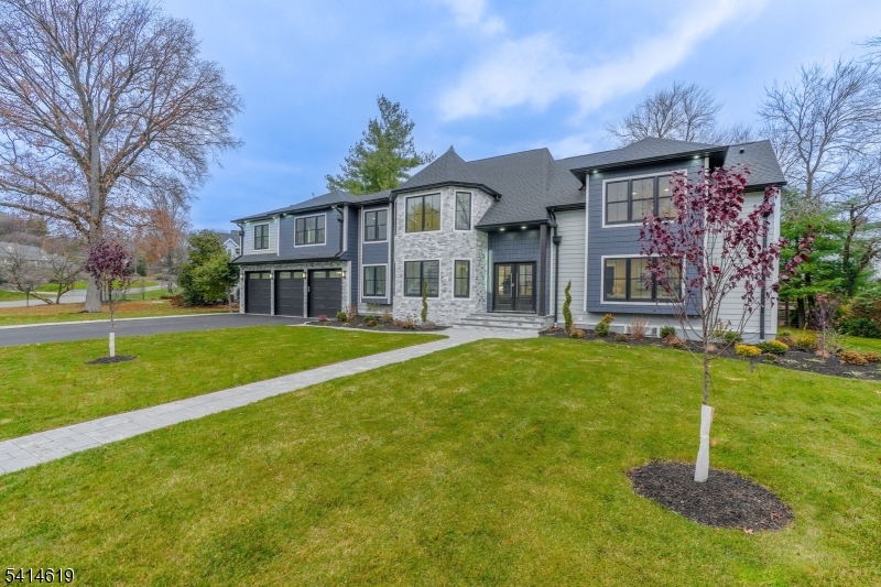 Experience refined living in this expansive 6-bedroom home spanning over 7,000 sq ft, perfectly positioned in the Old Country Club section of town. Located on the west side within the highly desirable Orchard School District and offering effortless access to both Glen Rock and Ridgewood?s vibrant downtown, NYC trains and buses, boutique shopping, and acclaimed dining, this home delivers exceptional convenience without compromise. Fully renovated and expanded, this home spans 3 beautiful levels, and showcases soaring ceilings, sun-drenched interiors, and a seamless flow ideal for grand-scale entertaining and everyday living. The finished lower level, complete with a kitchenette, wine cellar, generous living space, full bathroom, laundry and bedroom suite, offers an elegant and private retreat. Set back with a sense of tranquility and privacy, the property reflects the very essence of Ridgewood?s refined suburban lifestyle: a community that feels both connected and intimate. This home is more than a residence; it is truly a place to belong.