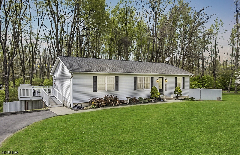 Fully renovated in 2018, 4/5 Beds and 3 baths desirable Green Twp. This home features two Gourmet Kitchens, Quartz (Level 1) and Granite Counters (Level 2), Commercial Grade Appliances. Full Open Concept on both levels.  Main level features 3 bedrooms and 2 full baths.  Family room boasts Reclaimed Barn Wood Accent Wall, and Hand-scraped Hickory Flooring. Bottom level is Perfect for In-law suite with 4th bedroom and a 5th bedroom or Office.  Both levels have own Laundry Room.  New HVAC including new baseboard throughout. Plumbing and electric also new in 2018. Deck overlooks fenced in yard with both 1st floor and ground level. Yard extends well beyond the fence. 6+ parking spots.  Can add detached garage for a 20k fee if desired.   Priced to sell quickly.  Move in ready.  All inspections done.