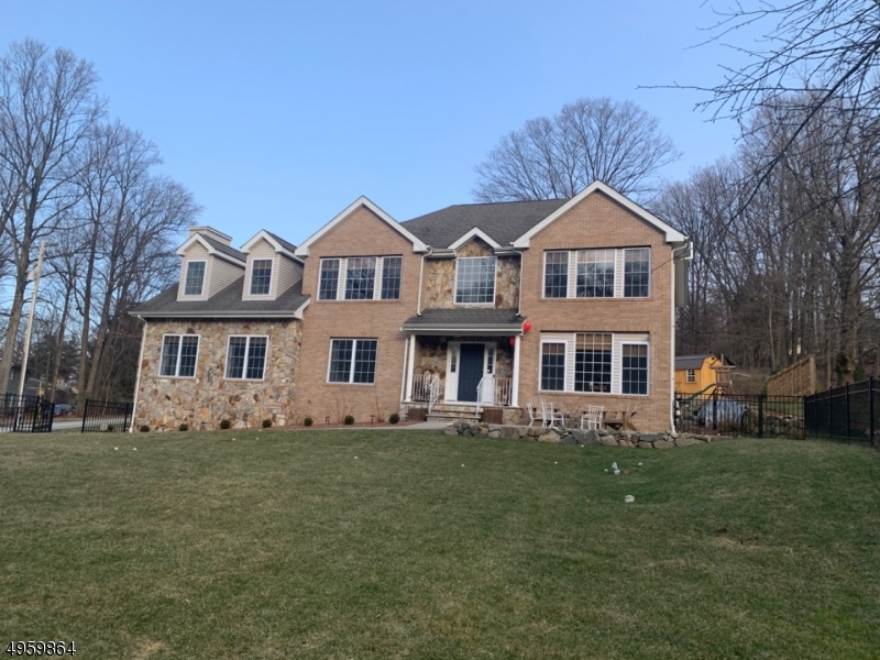 Beautiful Custom Colonial . Impeccably maintained, immaculate, move-in ready and priced to move.  Rich design and detailing throughout. Dozens of oversized windows flood the home with natural light. 1st floor features 9' ceilings, 2 story foyer, eat-in chefs kitchen with newer appliances, abundant cabinetry and workspace, center island, patio access, gorgeous DR, FR w/ FP, executive office/sitting rm ,living rm, laundry rm w/utility sink and WI pantry. 2nd Fl master w/sumptuous bath & 2 WI's. 2nd suite w/large bathroom &  6x13 WI. 2 additional grand sized bedrooms and storage.   37x26+-basement for hobbies,  recreation, utilities & generator hook-up. Great 1/2 acre property w/large patio, newer perennial landscaping, hardscape and lighting, irrigation, fully fenced front yard & new shed. Great  location!