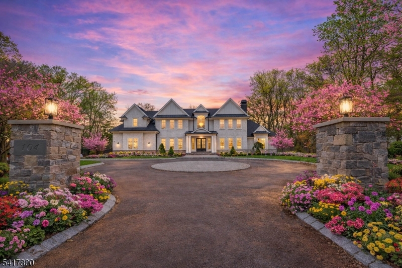 Welcome to this stunning, newly built, Custom, luxury home on a 2.06 Acre Corner lot, offering 10,432 sf of finished space. 6,832sf of living space + 3,100sf fully finished basement and a 500sf accessory structure. Total of 5 bedrooms and 7.5 bathrooms, including 1st and 2nd floor primary suites plus 3 en-suite bedrooms. Radiant heat throughout the entire home including the 4 car garage! total of 13 zones + 5 zone central air. 7 inch engineered white oak floors, custom cabinetry & 4 fireplaces. Gourmet kitchen with Sub Zero appliances, rangecraft hood, double island. Soaring ceilings 10 ft first floor, 9 ft second floor & basement. Outdoor kitchen, 400 amp underground electric, new well & septic. Attached 4 car garage with 13 ft ceilings, 2 driveways, 10,000sf of Belgian block driveway. A true masterpiece blending luxury, comfort & sophistication.