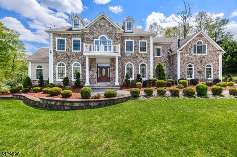 Beautifully maintained stone front center hall colonial in much desired Highland Farm section of Chester Township.  Private end of cul-de-sac location complete with patio, built in grill, professional landscaping and paver driveway.  Two story great room with wood burning fireplace opens to kitchen which comes equipped with stainless steel appliances including oversized sub zero refrigerator and double oven as well as five burner gas stove.  Large formal living room continues to a stunning conservatory with oversized windows for natural light any time of day.  Library/Office has recently renovated full bath.  Large primary suite with fireplace, two walk in closets, sitting area which includes  private deck overlooking rear of yard.  Additional ensuite bedroom with updated shower complete with Pulse Makena shower spa panel system.  Two additional bedrooms enjoy a jack and jill bathroom also complete with Pulse Makena shower spa. Finished lower level has home theatre, wet bar, recreation area as well as separate space for home gym.  This home comes complete with a whole house generator.