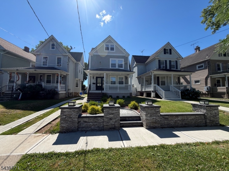 Welcome to this beautifully updated Colonial, renovated in 2025 and offering the perfect blend of modern style and classic charm. This move-in-ready home features 4 bedrooms, 3 full bathrooms, and 2 half bathrooms across three finished levels of living space. The first floor welcomes you with an inviting entry foyer, formal living room, elegant dining room, and a stunning kitchen with a breakfast island. A convenient half bath and a first-floor bedroom with access to the spacious deck complete this level, making it ideal for everyday living and entertaining. The second floor features two bedrooms and two full bathrooms, including a primary suite with its own private bath. The third floor offers an additional bedroom and full bathroom, perfect for guests, a home office, or extended living arrangements. The finished basement provides additional living space with a family room, laundry room, and a half bathroom, offering flexibility for recreation, work, or relaxation. Additional highlights include a one-car garage and dual access from both Weaver Avenue and Lewis Street. Conveniently located near parks, schools, shopping, dining, major highways, and public transportation, this home offers easy access to downtown Bloomfield, Montclair, Glen Ridge, Newark, and NYC-bound transit options. Don't miss this exceptional opportunity to own a beautifully renovated home in one of Bloomfield's most desirable neighborhoods.