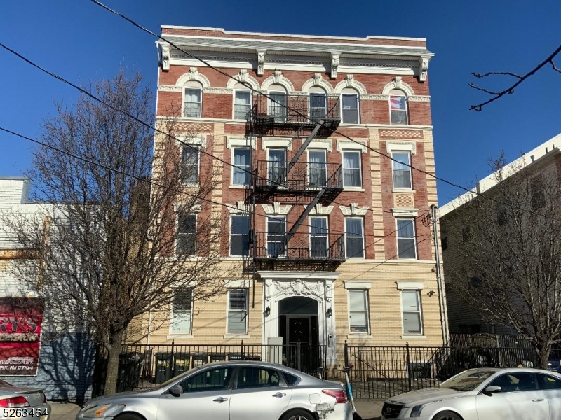 BUILDING FOR SALE LOWER NORTH NEWARK SECTION 12 APARTMENTS , 12- 2 BEDROOMS , LIVING ROOM KITCHEN BATHROOM . BUILDING RENOVATED 2012 AND 4 OUT OF 12 RENOVATED 2023. FLOATING AND CERAMIC FLOORS . ALL SEPERATE UTILITIES ALL UNITS WITH CENTRAL AC/HEAT 13 GAS METERS . 13 ELECTRIC METERS STOVE DISHWASHER INCLUDED . FULL FINISHED BASEMENT WITH UTILITY ROOM AND USED FOR STORAGE FLAT RUBBER ROOF, SPRINKLER SYSTEM  SURVELLIANCE CAMARAS BRICK BUILDING ALL AROUND REAR YARD CONCRETE FLOOR NEAR ROUTE 21 AND BROAD ST LIGHT RAIL STATION MONTHLY GROSS INCOME $ 17,966.30