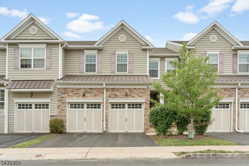 Prepare to fall in love with this trendy, young townhome impeccably designed & situated in the highly desirable Montgomery Ridge community. Freshly painted & move-in ready, this home features high ceilings, gleaming wood floors across the first level, brand new carpeting in basement & 2nd floor, & elegant, recessed lighting throughout. The heart of the home is a spectacular open-concept main floor anchored by a huge kitchen island/breakfast bar perfect for casual dining & entertaining. Chef-ready finishes incl. granite counters, stainless steel appliances, walk in pantry & premium cabinetry, all flowing effortlessly into cheerful living spaces. Rear deck for outside enjoyment. Upstairs, the primary BR suite is a true retreat, boasting large walk-in closet & luxurious bath w/ double sink, soaking tub & separate shower. 2 further BRs, main bath, an airy room-sized loft, & convenient laundry complete the upper level. Enjoy more living space w/ the fully finished basement illuminated by a large egress window perfect for a bright home office, media room, exercise room or play space. Roomy 2 car garage just painted w/ epoxy floors + 2 car driveway. Easy 1/2 mi. scenic stroll to new Montgomery municipal complex w/ police station/library. Home is perfectly situated close to Montgomery Twp. schools, excellent local strip malls with shopping/restaurants & a quick drive to the world-class dining, boutique shopping, and historic charm of downtown Princeton. This one certainly has it all!