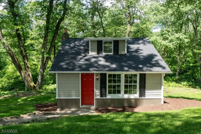 Private Retreat! This beautifully renovated cottage is tucked away at the end of a quiet dead-end street, offering plenty of privacy and a peaceful setting. Updated from top to bottom, the home features a brand new kitchen with new appliances, vinyl flooring, new hot water heater, new roof, and vinyl windows. The first floor includes a cozy living room, updated kitchen, dining area and updated full bath. Upstairs, the open loft-style bedroom creates a bright and airy retreat. The basement provides a laundry area and ample storage space. Just move right in and start enjoying the tranquility. Whether you're searching for a year round home or the perfect weekend getaway, this charming cottage offers comfort, privacy, and a relaxing escape from it all. A brand new septic system will be installed before closing. Welcome home!