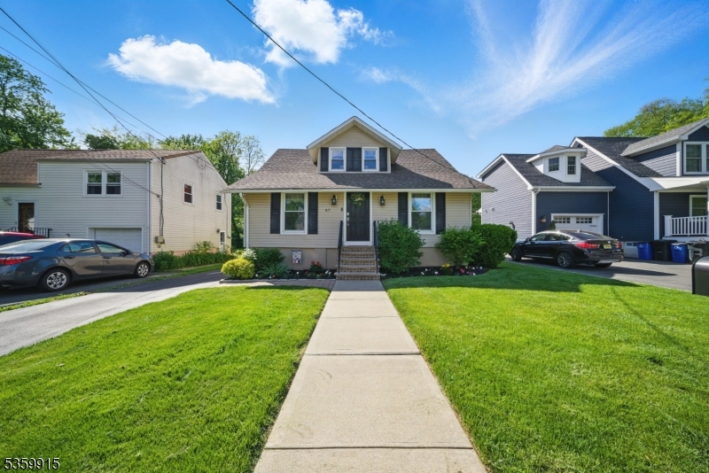 Pristine, Updated and Charming Downtown Denville Cape. True Pride of ownership in this custom home! Spectacular expanded Cape, pristine condition. Updated top to bottom. Sweet sitting area welcomes you into the foyer which is bookended by the large living room and formal dining. Granite galley kitchen with stainless steel appliances open to the bonus family room with sliders to the deck and flat backyard. Convenient powder room. Gleaming hardwood floors and custom moldings. An abundance of natural light. Versatile floor plan, perfect for entertaining or every day living. Upstairs features 3 bedrooms and a full bath, including the primary with ample closet space. The walk-out unfinished basement provides lots of storage and laundry. If the house isn't perfect enough, you will fall in love with the neighborhood and close proximity to bustling Downtown Denville. Walking distance to Broadway Ave, school, sports fields, playground, restaurants, shopping and many events that make Denville so desirable. As well as commuter locations for bus/train direct into NYC. Great schools. Public utilities; french drain & generator hookup.