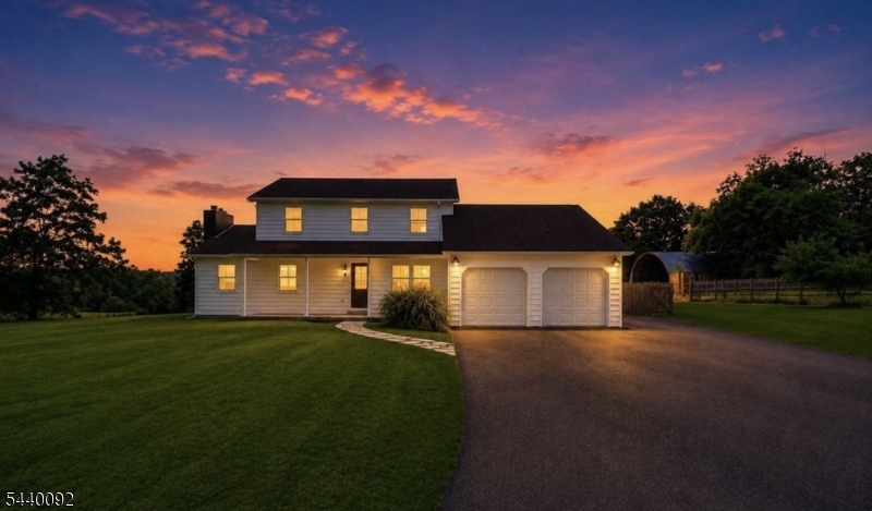 Welcome to this beautifully renovated 4-5 bedroom, 2.5 bath home situated on nearly 4 acres across two separately deeded lots. The main home sits on 1.92 acres, with an additional 2-acre lot included, offering exceptional privacy. . A long, oversized driveway leads to the 2-car garage and this move-in-ready home featuring new windows, fresh paint, recessed lighting, new hardwood floors, and new interior doors throughout. The brand-new kitchen boasts quartz countertops, a large eat-in island, stainless steel appliances, and a subway tile backsplash, complemented by charming shiplap accents and a wood ceiling. The oversized family room features a stunning stone wood-burning fireplace, while the first floor also offers a flexible office/den that can serve as a 5th bedroom, a half bath, and a mudroom with new Carrera tile flooring. Upstairs, the spacious primary suite includes a beautifully renovated bathroom with a standing shower, new vanity, flooring, and toilet. All bathrooms have been updated. Additional features include baseboard heat, a water filtration system, walk-out basement, shed and hay house, and an expansive property perfect for enjoying country living with modern comforts. A rare opportunity to own a fully updated home with two separately deeded lots totaling nearly 4 acres--offering space, privacy, and endless possibilities. LOW TAXES!!! Some pictures have been rendered with AI for visual and illustrations purposes ONLY!!! The actual finished product may differ.