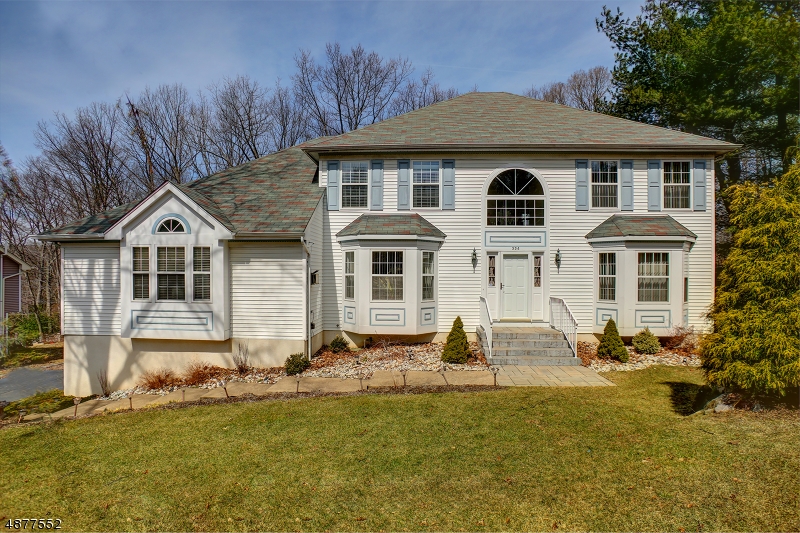 Bright and spacious colonial with hardwood floors and a great floor plan filled with natural light. The heart of the home, the kitchen opens to family room and off kitchen sliding glass doors to deck overlooking nice yard. Family room with wood burning stove! Great room features vaulted ceilings and a gas fireplace with a marble hearth and decorative mantel. Living Room currently used as office. So much sunlight! Travel upstairs to 4 generous sized bedroom including Master with Master Bath with jetted tub and separate shower. Master Bedroom  has a tray ceiling with double doors from hallway to enter. Large walk in closet. Finished basement with outside entrance for easy entertaining. To show this well cared for home is to sell it.