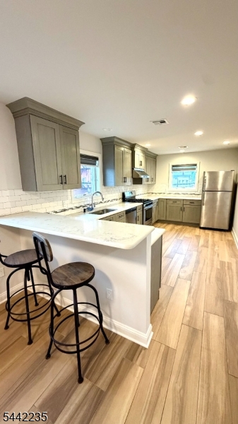 Be the first to enjoy this beautiful, bright and modern two-bedroom apartment, located in an intimate boutique building offering exceptional privacy. The airy, open-concept layout is perfect for both everyday living and entertaining, featuring a sleek kitchen with a large island that flows seamlessly into the spacious dining area and living room. Both generously sized bedrooms offer oversized closets, while the large, beautifully finished bathroom provides comfort and style. The apartment also includes a private in-unit laundry room, assigned tenant parking and ample street parking. Ideally situated on Main Avenue in the heart of Butler, with restaurants, shops, schools and public transportation all within walking distance. Bright, spacious, private and incredibly convenient, this is the apartment you have been waiting for!