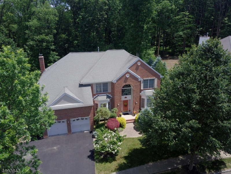 BEAUTIFUL & SERENE CHC ON OVER AN ACRE OF LAND FEATURES A DRAMATIC OPEN FLOOR PLAN, CATHEDRAL CEILING FAMILY ROOM W WOOD BURNING, FULL MASONRY FIREPLACE & EXQUISITE VIEWS FROM PALLADIUM WINDOWS OVERLOOKING THE BACKYARD. THIS HOME HAS A FULL FINISHED, WALK-OUT BASEMENT W/ DRY BAR, GAME / EXERCISE ROOM, FULL BATH & TONS OF STORAGE. THE KITCHEN FEATURES 42 INCH CABINETS, NEW WHIRLPOOL S/S APPLIANCES, CORIAN COUNTERTOP /SINK  & SLIDER LEADING OUT TO TREX DECK, PERFECT FOR ENTERTAINING. TOP-OF-THE LINE LANDSCAPING W/ ATTENTION TO EVERY DETAIL. THE 2ND FLOOR FEATURES MASTER SUITE WITH VAULTED CEILING, 2 WALK-IN CLOSETS & 3 MORE GENEROUS BEDROOMS, ONE WITH AN ALCOVE W/ BUILT IN STORAGE. NEW BATHROOMS FEATURE QUARTZ COUNTERS. HOME GENERATOR INCL. MINUTES TO PARK/RIDE BUS TRANSPORTATION, SCHOOLS & PARKS.