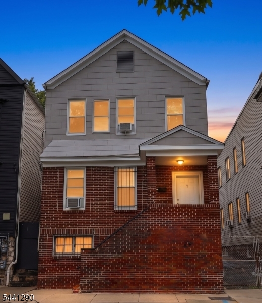 Welcome to 92 S Devine St, an exceptional two-unit property in Newark's Lower Vailsburg with direct views of Vailsburg Park. Ideal for investors or owner-occupants, the second floor will be delivered vacant, and the first potentially vacant too. Each unit offers 3 bedrooms, 1 bathroom, bright interiors, wood-look flooring, and modern kitchens with stainless steel appliances. The unfinished basement has a separate entrance, offering a blank canvas for renovation. An oil tank was professionally removed with certification of no soil contamination. The front of the home was recently power washed and painted. Outside, enjoy a private backyard and a driveway fitting 3 cars. This location is a commuter's dream: 1 block from the NYC express bus and 1 minute to the Garden State Parkway. You are 15 minutes from Newark Penn Station, Newark Airport, Jersey Gardens, and Weequahic Golf Course. Schedule a private tour today!