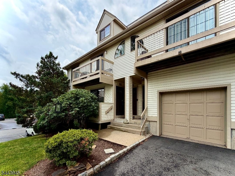 Move right into this stylish End-Unit condo in The Cedars of Bernards Township! This bright and inviting home offers an exceptional blend of comfort, space, and convenience. The spacious eat-in kitchen features sliders leading to a private deck, the perfect setting to enjoy outdoor dining. The adjacent formal dining room is filled with natural light from oversized windows and flows seamlessly into the welcoming living room, where a cozy wood-burning fireplace and a second set of sliders lead to an additional deck, creating an ideal space for relaxing or entertaining. Bright and flexible, the versatile den leaves options for a third bedroom or home office. The ground level is home to a tranquil primary suite featuring two walk-in closets and a private en-suite bath and the 2nd bedroom with ensuite bathroom. Additional highlights include an attached one-car garage plus nearby open parking for guests. Residents of The Cedars enjoy outstanding community amenities, including a swimming pool, clubhouse, tennis and basketball courts, and a playground, all set within a beautifully maintained neighborhood. This highly desirable location offers Top-Rated schools, dining, and endless shopping, all with seamless access to Routes 287, 78, and 206. From its thoughtful layout to its unbeatable setting, this home truly has it all!