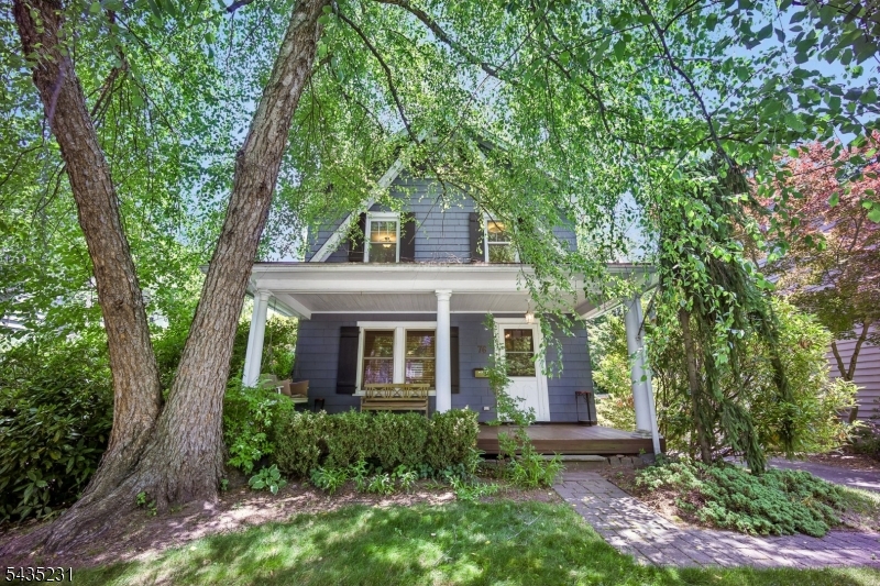 LOCATION, LOCATION, LOCATION...you found your dream home! This quintessential Glenwood 3-bedroom, 1-bath Colonial is perfectly situated in a PRIME Glenwood location. The dreamy front porch is ideal for morning coffee or relaxing with a good book. Step inside to a warm and inviting family room featuring a wood-burning fireplace, flowing seamlessly into the updated kitchen and dining area. Beautiful hardwood floors run throughout the home. Upstairs offers three spacious bedrooms and a full bath, while the finished third level provides the perfect bonus space for a recreation room, home office, playroom, or sleepovers! Just steps from Short Hills/Millburn restaurants, gyms, hair and nail salons, downtown shopping, Midtown Direct train service to NYC, and the Boxcar Bus to NYC. This home truly has it all and won't last! SOLD AS-IS, Porch swing included w/sale.