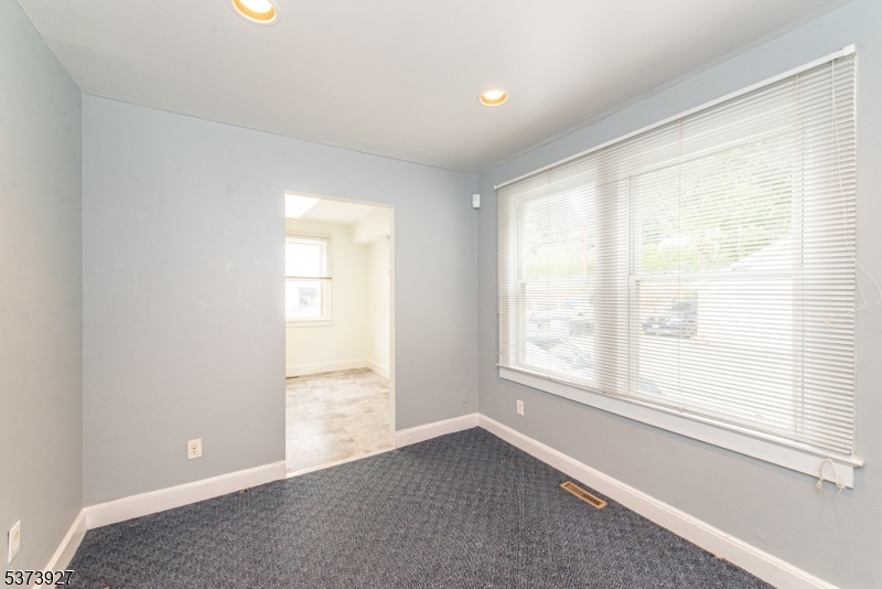 Available immediately. First floor, office suite. Great location in Denville!! Located in between NYC Direct Denville and Mount Tabor Train Stations with tons of parking on Route 53. Plenty of parking!! Handicap ramp at entrance. Two hallway bathrooms. All utilities - electric, heat, sewer, snow removal, etc included except for internet/phone. Building is shared other professional services such as trucking company, shipping, lawyers, monuments, driving school, psychologist, massage therapy, etc. Easy to find for customers/clients. Lots of eyes/traffic on signage out front. Have your business thrive at 435 East Main Street. There is also a 2nd floor suite available at #204 for $650/month.