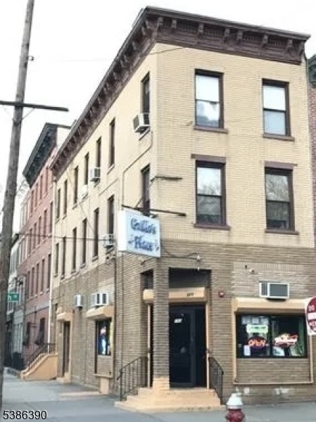 Opportunity Waits in the Historic Downtown 3 Story Building, Featuring Guillo's Place (an ongoing Business for 36 years) a Ground Level Walk-In Bar that has Hosted Episodes of the SOPRANO'S. The purchase iIncludes the Liquor License "33 " (This License is a Plenary Retail Consumption License, Which allows a business to serve beer, wine and spirits for on-site consumption and to sell Beer and Wine To-Go for off site consumption).  This License is Ideal for Establishments that Focus on Dining and Drinking Experience. Bars, Restaurants, Lounge, Speak Easy.  This is a Mixed Use Building, The Upper 2 Floors are Residential Apartments. The Neighborhood has Great Walkability and close to Public Transportation.  This is Strictly an As-Is-Sale.  Inventory Sold Separately and Not Included with the Sale of the Property.