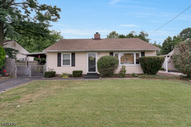 Tucked away deep in the neighborhood is an absolute charming, affordable, adorable well maintained property that is just waiting to welcome you in! Tons of cabinets surround the eat in kitchen, large utility rm/pantry is perfectly situated for convenient storage. GORGEOUS brand new cherry wood flooring, brand new Hampton Bay ceiling fans and a new hot water heater. The primary bedroom has custom built INS that offer even more storage options.  Another spacious bedroom includes a bonus room and has your choice of use with a skylight..maybe an office? maybe a little library or a craft room! Lots of closet space in each. An updated main bathroom, and all the appliances are included. Huge picture window in the enormous living room makes it so comfortable you could just relax..go ahead put on a good movie!! Need a little more storage..brand new attic pull down stairs, install some plywood down and you have much more storage space to throw those items up here you do not use as frequently. Just wait until you go outside into the sprawling, fenced in backyard, which also is partially covered by the carport and fans out into a beautiful yard with some mature landscape that would be perfect for entertaining all summer long. This is a hidden gem, great for single floor living, condo alternative, down sizing, or first time buyers. You better come and get it! Convenient to shopping, restaurants, schools, parks, major highways, public transportation, and more. Come on in and take a look!