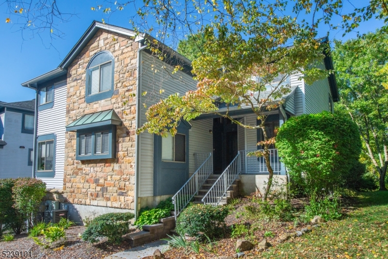This fully renovated home boasts 2 bedrooms, 2.5 bathrooms, a 2 car garage, & a finished basement. Step inside to discover a light-filled haven thoughtfully designed with a contemporary & neutral aesthetic, accentuated by gleaming hardwood floors throughout. The open-concept living & dining area offers a spacious & welcoming ambiance, perfect for hosting gatherings or relaxing. The center of this home is the stunning eat-in kitchen. It features two-tone cabinets adorned with sleek brush nickel hardware, stainless steel appliances, & ample counter space for cooking. Upstairs is a full bathroom, a bedroom, & the primary bedroom en-suite. The primary bedroom offers a private balcony, providing a serene retreat for morning coffee or evening relaxation. The en-suite bathroom is a true sanctuary, with a freestanding tub, a beautifully tiled shower, a double vanity, & abundant natural light. The finished basement adds a versatile space, ideal for a family room, playroom, guest room, or office. A separate laundry room & convenient garage entrance add practicality to the daily living experience. This townhouse is completely renovated, ensuring an easy move & all the comforts of a brand-new home. There's easy access to local amenities, shopping, dining establishments, & highways like Route 80/46, making it a desirable area. Schedule a tour & experience the luxury & convenience this property has to offer!
