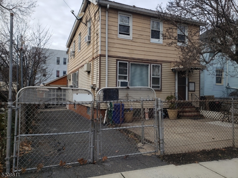 BOM--Great opportunity to purchase this two family house in the nice, residential neighborhood of Belleville.  First floor consists of living area, two bedrooms and full bath, kitchen is in the basement and another living area and full bath, 2nd floor is renovated with three nice size bedrooms, eat in kitchen and living room, tastefully decorated and receiving $1,500 rent, month-to-month.  Parking for 8 cars, garage and office. Both lots 17 & 18 have been merged for easy purchase.  Lot 17 is 30X85 and Lot 18 is  30X89.99.*  Price for both lots is $475,000, taxes are low combined.