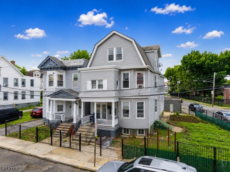 This triplex at Irvington features 7 bedrooms and 4 bathrooms across 2,760 square feet of living space. The basement includes a full kitchen and bathroom. Property is fully occupied and each unit has separate utilities. The property is well-laid-out and conveniently located near schools, shopping, and transportation.