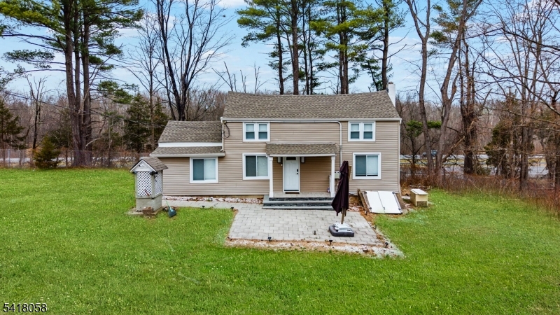 Set on an expansive 3.49-acre level lot, this charming circa-1830 carriage house Colonial offers a rare opportunity to own a piece of Warren's history with endless potential. Featuring 4 bedrooms and 2 full baths, the home showcases character-rich details such as beam ceilings, inviting living spaces, and a classic layout with a separate dining area. The property includes a detached 2-car garage, outbuildings, and a storage shed, perfect for hobbyists, storage, or future possibilities. Enjoy peaceful surroundings from the open porch overlooking the serene, private setting. With public sewer, well water, and propane heat, this home combines country charm with modern-day essentials. Conveniently located near major roads, shopping, and highly regarded schools, this unique property is ideal for those seeking space, privacy, and historic character.