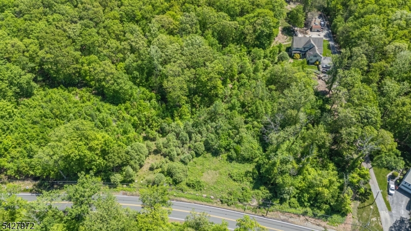 Prime opportunity to own a private, wooded lot in a fantastic location! These expansive vacant parcels are a blank canvas, perfect for contractors, builders, or anyone looking to create their dream home. Featuring mature trees and a serene natural setting, these unimproved lots offer endless potential. Whether you're envisioning a secluded retreat, a custom-built home, or an investment project, the possibilities are limitless. Don't miss out on this rare chance to secure a large lot with privacy, convenience, and room to bring your vision to life. Prior approvals have expired, however all paperwork is on file. Buyers please do your due diligence with Jefferson Township. All 3 lots had prior building permits, perc tests, site plan approvals, surveys & soil boring tests completed back in 2009. Original plans were for one 4 bedroom single family home on each lot. Everything has expired! The seller is happy to share all documentation to serious qualified buyers. All 3 lots had prior building permits, perc tests, site plan approvals, surveys & soil boring tests completed back in 2009. Original plans were for one 4 bedroom single family home on each lot. Everything has expired! The seller is happy to share all documentation to serious qualified buyers.