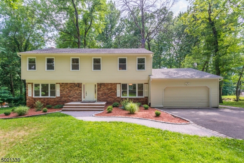 Spacious 5 bedroom colonial in beautiful Butterworth Farm neighborhood of Morris Township! Home features an open concept living space with formal living room, family room, eat-in kitchen, and dining room. 5th bedroom on first floor can be used as a guest room or home office. Upstairs you will find ample sized bedrooms and lots of closet space. Master bedroom boasts a large walk-in closet and master bath. Enjoy summer nights in the private backyard and on the deck and patio. Walking distance to Patriot's Path and Streeter Pool. Commuters dream, easy access to highways and close to Morris Plains train station.