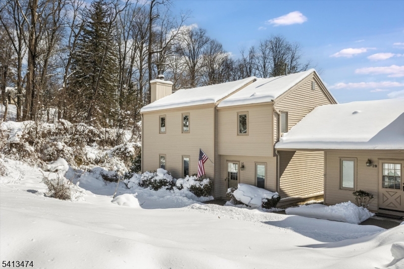 Beautiful Somerset Hills Village end-unit townhome in the heart of downtown Bernardsville. Backing to a wooded lot, this special home offers privacy and a peaceful setting.This 3-bedroom, 2.1-bath residence with an attached one-car garage showcases numerous high-end upgrades, including a new roof and furnace (2019), fully renovated bathrooms (2021), hardwood floors on the first level (2017), and new flooring in all bedrooms.The welcoming foyer opens to a powder room and an open floor plan ideal for entertaining. The spacious living room features a wood-burning fireplace, and the formal dining room has sliding doors to a deck perfect for grilling and outdoor enjoyment. The kitchen offers granite countertops, stainless steel appliances, ample cabinetry, and direct garage access for everyday convenience.Upstairs, the primary suite includes a beautifully renovated en-suite bath. Two additional generously sized bedrooms share an updated hall bath. The finished basement provides flexible space for recreation, gatherings, or a quiet retreat.Filled with natural light and abundant storage, this home is truly move-in ready. Enjoy easy access to downtown shopping, restaurants, library, NYC train, and Newark Airport.Fireplace conveyed as-is with no known issues.