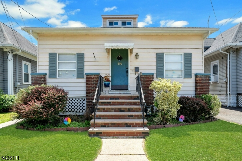Move-In Ready Cape Cod! Beautifully maintained 4-bedroom home featuring 2 bedrooms on the first floor, 2 upstairs, an office/flex room, and three walk-in closets. Hardwood floors throughout the first floor, a bright living/dining room, spacious eat-in kitchen, and enclosed front porch.The full unfinished basement offers great potential for additional living space. Recent updates include a new roof, furnace, water heater, windows, electric system, and laminate flooring upstairs.Conveniently located near schools, shopping, dining, parks, major highways, and NJ Transit with direct access to NYC.A must-see home with space, updates, and a great location!