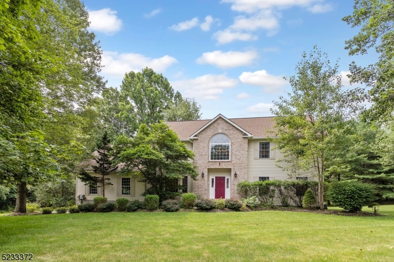 Introducing this five bedroom Centre Hall home located in the coveted Shongum section of Randolph. Situated on the eastern end of town, this property offers a prime location providing ample space.  No need to worry about private wells or septic systems as this home is connected to public utilities, offering convenience and peace of mind. The convenience of a first-floor bedroom & full bath, providing flexibility for guests, multigenerational living, or use as a home office. Kitchen with granite countertops, center island, SS appliances elevate the culinary experience, while a slider door leads to a deck, perfect for outdoor entertaining. Home features a LR, formal DR, and FR off of kitchen. With multiple bathrooms, including en-suite options with a jetted tub, shower & double sinks ensure convenience. Say goodbye to morning rush hours! Primary en-suite with two walk-in closets & an additional 3 good sized bedrooms. First floor laundry. Newer roof. Nearby amenities such as shopping centers, restaurants, parks, and schools further enhance this home. Renowned Shongum K-5 school and Randolph Middle High School. Convenient commuting location to both Morristown and Morris Plains! Whether you're a commuter or simply want to enjoy that this home offers proximity to midtown direct train stations, shopping, theaters, restaurants, and the nightlife of downtown Morristown.