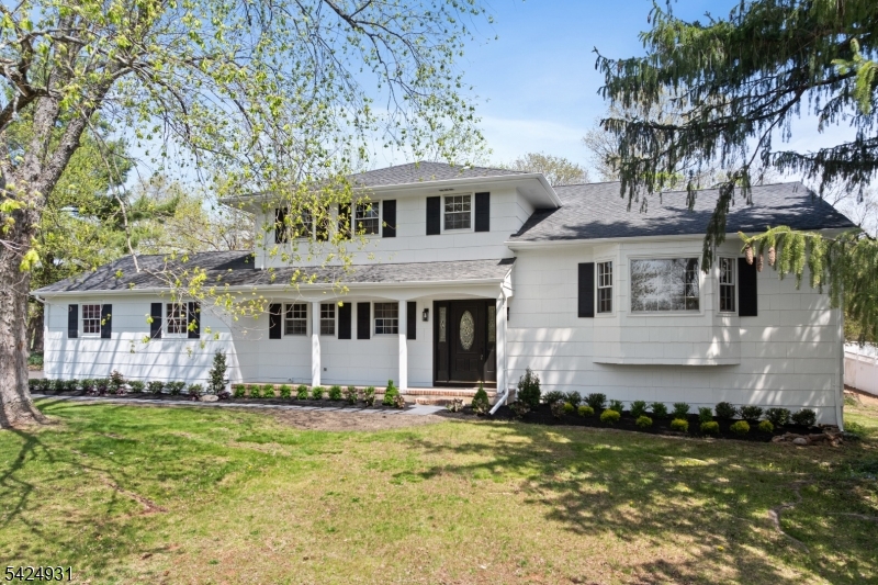 BACK ON MARKET through no fault of seller + PRICE REDUCED for quick action! Completely renovated in 2026, nearly every inch of this home has been thoughtfully redesigned with today's modern style and finishes. Newly finished hardwood floors, recessed lighting, designer fixtures and beautifully updated bathrooms elevate the entire home. The stunning new kitchen features a waterfall quartz countertop with breakfast bar, herringbone tile backsplash, elegant tile flooring & premium stainless steel appliances including a gas range, exhaust hood and refrigerator. The adjacent family room opens seamlessly to the kitchen and is anchored by a wood-burning fireplace. The formal dining room showcases a striking bubble chandelier--a true statement piece. A sunlit living room with a large picture window, along with a private office & powder room, complete the main level. Upstairs discover four spacious bedrooms and two fully renovated baths, including a luxurious primary suite with a spa-like en suite bath. Additional highlights include a freshly painted exterior, private backyard with patio and shed plus a 2-car garage. Public water and sewer, roof approx. 2 years old and a brand-new furnace. The full basement is immaculate, featuring an open ceiling painted black for a trendy industrial look. Ideally located in sought-after Hillsborough, known for top-rated schools, beautiful parks/nature trails & easy access to shopping, dining & commuting.  MOVE RIGHT INTO this truly turnkey home!