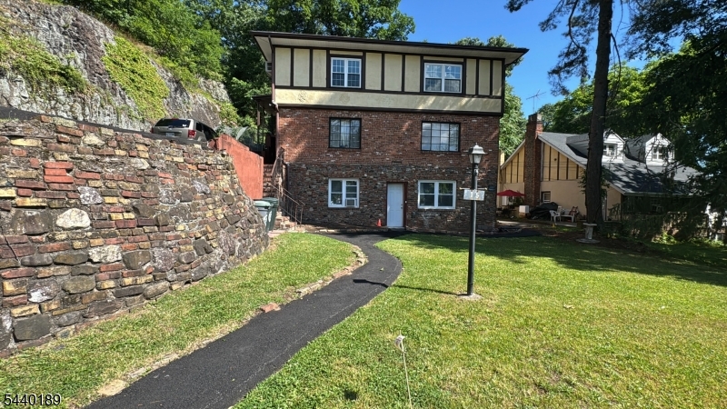 Beautifully updated first-floor apartment located on a quiet dead-end street in Hawthorne, NJ. Enjoy a peaceful neighborhood setting with fresh air and tranquility. This inviting unit features a spacious bedroom with ample closet space, a full bathroom with a tub, and a comfortable kitchen that opens to the dining and living areas, creating a desirable open-concept layout. The property also offers a beautifully maintained front yard and an assigned parking space directly in front of the home.Landlord covers heat, hot water, and cold water, providing added value and convenience. Conveniently located near shopping, restaurants, parks, schools, and major transportation routes. Don't miss this opportunity to enjoy comfortable living in a desirable Hawthorne location.