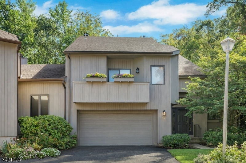 This amazingly spacious, bright, and open 3 bedroom, 2 1/2 bath end-unit townhome is situated in one of the best locations in Spruce Edge! At the end of the cul-de-sac, backing woodlands, the home's orientation fills the home with streaming sunlight through oversized windows and skylights. It's just awaiting your vision. Step into the first-floor hall revealing the expansive two-story living room. Soaring ceilings, an inviting alcove, and walls of windows make this stunning room ideal for everyday living or entertaining. The updated kitchen features beautiful cherry cabinets, granite countertops, stainless steel appliances, and a large pantry. The adjacent octagonal breakfast room is bright and cheery with peaceful views. The family room offers a wood burning fireplace and sliders to the large back deck. A powder room and laundry room complete this floor. Up just a half flight of stairs is the spacious primary bedroom with a large walk-in closet, slider to a Juliet balcony, and an ensuite bath with double vanity, shower, and jetted tub. On the landing above, you'll discover the dramatic view of the living room below. Two extra-large bedrooms with generous closets and another bath finish this floor. There's also a fabulous walkout unfinished basement with large windows ready to finish! Mountain Lakes offers top schools, beautiful lakes, miles of hiking, easy access to highways, transportation to NYC (just 30 miles away), nearby shopping, excellent healthcare, and restaurants.