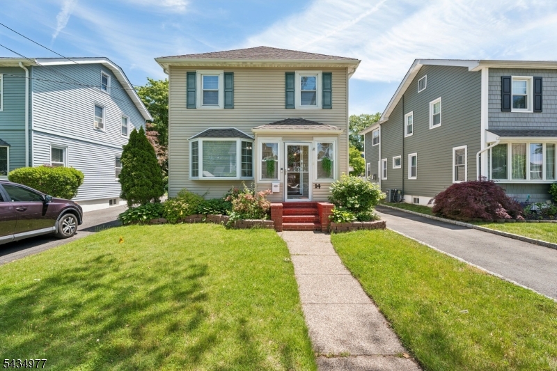 Welcome home to this well-maintained Colonial located in the desirable Oak View section of Bloomfield. Enter through the inviting vestibule into a sun-filled living room featuring a beautiful bay window. The updated kitchen offers stainless steel appliances, quartz countertops, and ample cabinet space. The first floor also includes a full bath and a spacious family room overlooking the backyard. The second floor includes a primary suite with a soaking tub, separate shower, and double sinks, along with two additional bedrooms and a third full bath. The fully finished basement provides the perfect space for a recreation or game room. Additional highlights include a 2-car detached garage, an underground oil tank that has been removed, and a new furnace installed in 2025