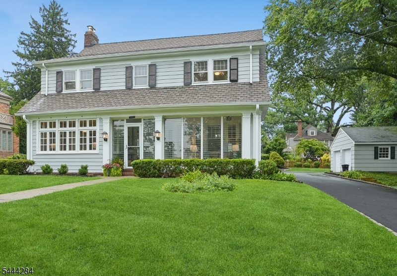Timeless elegance, classic charm, and exceptional craftsmanship define this meticulously refurbished 1920s Dutch Colonial, ideally situated in coveted Historic Washington Headquarters neighborhood. Set on a beautifully landscaped, nearly half-acre property with two car garage, this exceptional residence is just a leisurely 10-minute stroll to vibrant Morristown and train direct to NYC.  Rich in architectural character, the home offers five bedrooms, three full and one half baths, generous living spaces, gleaming refinished hardwood floors,elegant moldings, classic wall sconces, and abundant natural light throughout..A charming enclosed front sunroom, framed by two walls of vented windows, welcomes you into a breathtaking grand foyer with stunning staircase, beautifully crafted railing, and elegant cased openings leading to the living and dining rooms. Rich in architectural character,this home features generous spaces for everyday living and entertaining.The beautifully updated kitchen features quartz countertops, stainless steel appliances, a cooktop, soaring cathedral ceiling, and an inviting space for everyday living and entertaining. Numerous improvements include multi-zone centrTal air (2026), fresh interior and exterior paint, new driveway, and much more! This distinctive home presents a rare opportunity.