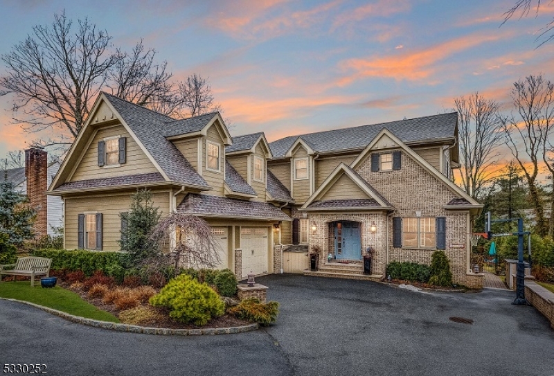 DISCOVER LUXURY LIVING! This stunning 5-bedroom, 5.1-bathroom estate offers a sophisticated blend of luxury and comfort, all set on a serene half acre lot. From the moment you step into the grand hall, you'll be captivated by the expansive open layout, ideal for both casual living and elegant entertaining. The first floor features a private guest suite, perfect for accommodating visitors with comfort and privacy. The gourmet chef's kitchen is a true masterpiece, featuring vaulted beam ceilings, custom cabinetry and high-end stainless steel appliances. It opens seamlessly into a spacious family room with a cozy gas fireplace and French doors leading to a covered back porch perfect for enjoying peaceful outdoor living. The finished basement is designed for relaxation and fun, with a dedicated gym and recreation area, while the lush backyard oasis offers complete privacy. Enjoy a heated gunite saltwater pool with a hot tub, grotto, and waterfall, two built-in BBQs with a refrigerator. Impeccably landscaped, this backyard provides the perfect backdrop for entertaining or unwinding in style. Additional features include a mudroom, two laundry rooms, nanny quarters, a 2-car garage, and ample storage throughout. The home is equipped with a whole-house generator and is located in a highly sought-after Deerfield neighborhood. Turnkey living at its best!