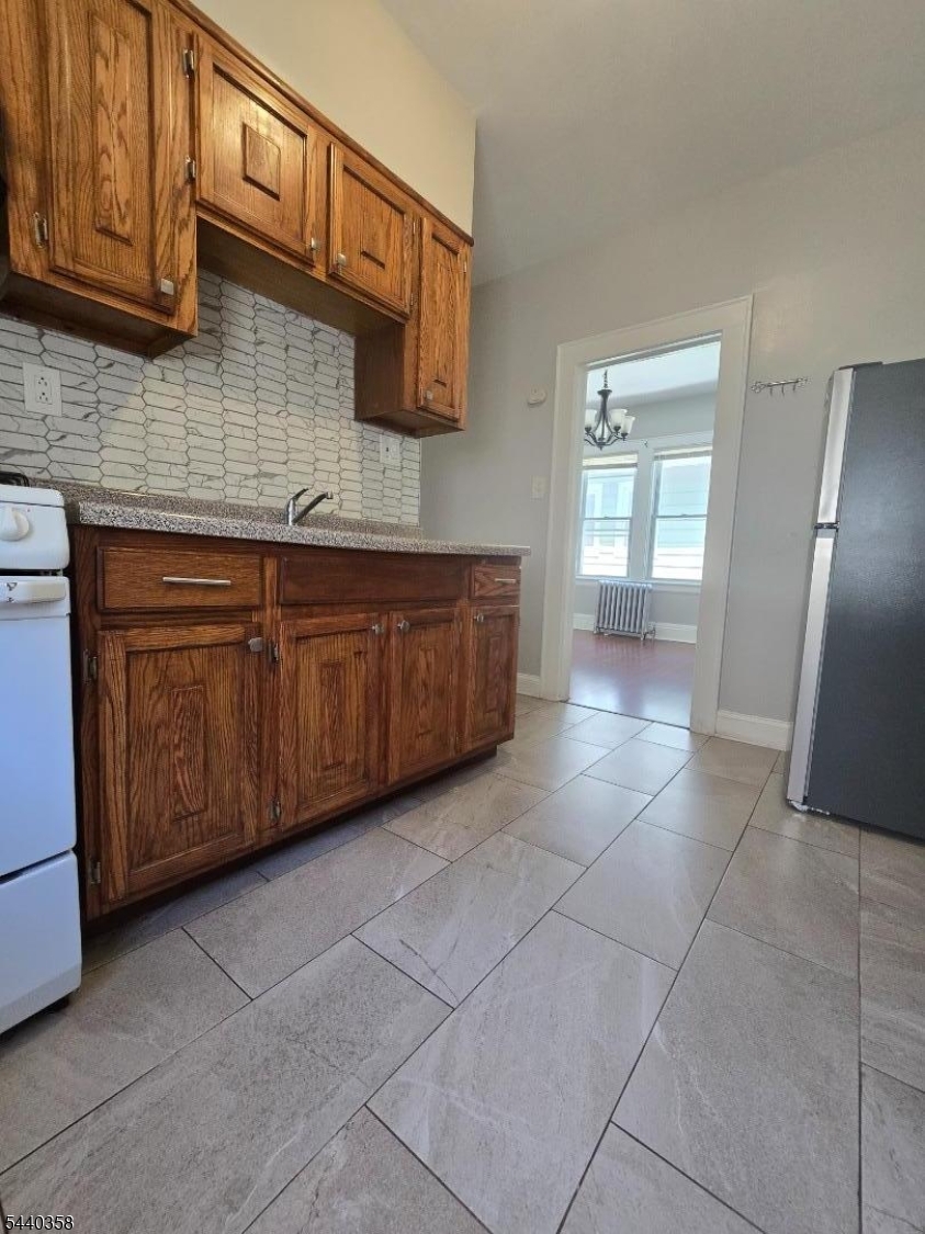 Open  Fri, June 19th  5:30pm-7:00pm2nd floor unit.  2 bedroom apartment features: recent updates, laminate floors, kitchen with modern backsplash and refrigerator.  The bathroom is updated with a stand up shower.  This unit includes a large storage room in the attic to the right.  It includes one parking space.