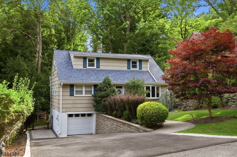 Nestled in Oakland's highly sought-after Manito section, this is the "peace of mind" home you've been waiting for. You know that never-ending to-do list that usually comes with buying a house? You can throw it away. Between 2023 and 2024, practically everything major was taken care of: a brand-new roof, gutters, shutters, an expanded driveway, gorgeous hardscaping (retaining walls, walkways, and a paver patio), a fully fenced yard, shed, and a refreshed deck with brand-new columns. Oh, and the big-ticket mechanics? The furnace, AC, and whole-house humidifier are all nearly new, too. Inside, this move-in-ready home features 4 bedrooms, 2 updated full baths with tiled showers over tubs, and gleaming hardwood floors throughout. The updated kitchen, featuring a slider that opens directly to a beautiful wood deck, is ideal for your morning coffee or hosting weekend barbecues. Downstairs, the fully finished walkout basement offers incredible bonus space, perfect for a gym or play area, as well as a laundry room and mudroom. Walk right out onto your paver patio and take in the expansive, lush backyard. With a brand-new fence, it's a private oasis perfect for relaxing and entertaining. Sq ft as per tax records.