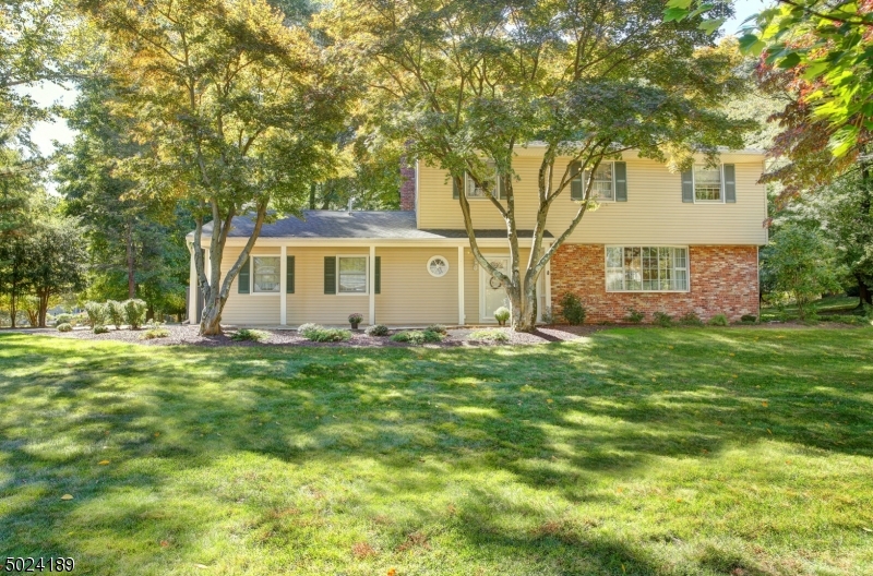 New roof, Furnace 2017, Kitchen 2018, New hardwood in kitchen, recently refinished floors, are just a few of the amenities that you will receive! Expect to be impressed with the maintenance, Perfection, and yes Mrs. Clean does live here. Step into the large foyer and gaze into the family room with wood burning fireplace, and raised hearth. New kitchen in 2018, Granite counters, and mosaic backsplash. Stainless appliances, open to dining room with hardwood floors, Living room with 4 casement bay window. Up to the second floor, Master BR with hardwood and bath. Plus 3 additional bedrooms. Now you also have an in law suite with Bedroom, living/dining room combination and kitchen. The basement has a partially finished rec room with painted floor and drop ceiling. The location and yard makes this a 10.
