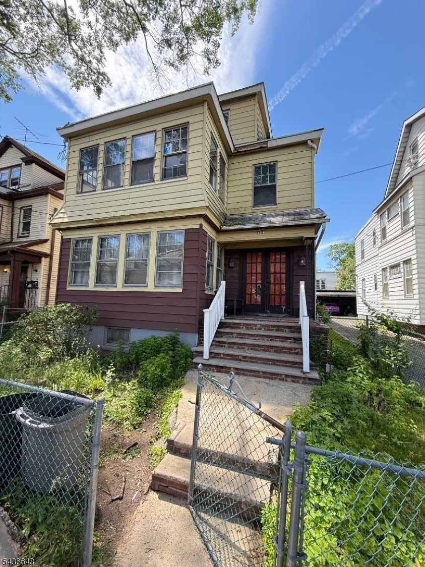 Welcome to this exceptional two-unit home featuring bonus third-floor space and outstanding potential. A great opportunity for whether savvy or aspiring investors looking to create excellent cash flow.Each unit features 3 bedrooms and 1 full bathroom, offering spacious layouts ideal for owner-occupants or tenants. The first-floor unit includes a bonus sunroom, providing additional living space filled with natural light and added versatility.The bonus third-floor space presents exciting possibilities for additional use, subject to buyer due diligence and local regulations.Drive by only.