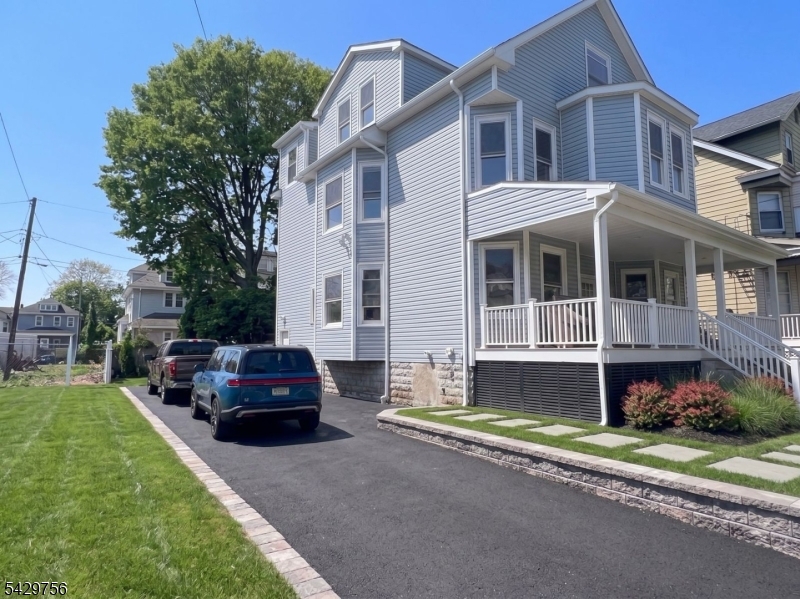 Newly renovated oversized apartments in Newark's Weequahic neighborhood with views toward the Newark Airport control tower and convenient access to Route 78, Bergen Street, Newark Airport, Downtown Newark, and NYC transportation.The property consists of three large apartments totaling approximately 4,322 square feet. Apartment 1 is a spacious duplex with approximately 1,973 square feet across the first floor and fully finished lower level with tall ceilings. Apartment 2 offers approximately 1,232 square feet, while Apartment 3 offers approximately 1,117 square feet and features a private ensuite bathroom in the primary bedroom. The second and third floor apartments each easily accommodate four bedrooms with bright open layouts, abundant natural light, and high ceilings throughout.Brand-new kitchens feature quartz countertops, matching stainless steel appliances, designer backsplashes, and sleek cabinetry. Bathrooms include oversized marble-style showers and modern finishes. The property also includes high-efficiency heat pump HVAC systems providing central air conditioning and heat, direct vent hot water heaters, recessed lighting, and in-unit laundry.Photos are virtually staged.