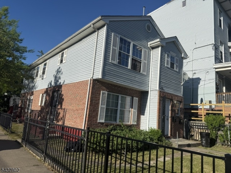 Welcome to this recently updated two-family home featuring 5 bedrooms and 2 bathrooms?an exceptional opportunity for both owner-occupants and savvy investors. Ideally situated on the corner of 15th Avenue and South 16th Street in Newark, this property offers outstanding convenience with easy access to the Garden State Parkway, Routes 280 and 78, Newark Penn Station just 10 minutes away, and Newark Liberty International Airport approximately 12 minutes away. Located near Rutgers New Jersey Medical School and University Hospital, with convenient access to public transportation, this home is perfectly positioned for commuters and those seeking everyday accessibility. Inside, you?ll find updated kitchens, new flooring on the first floor, and generously sized living spaces designed for comfortable daily living and effortless entertaining.