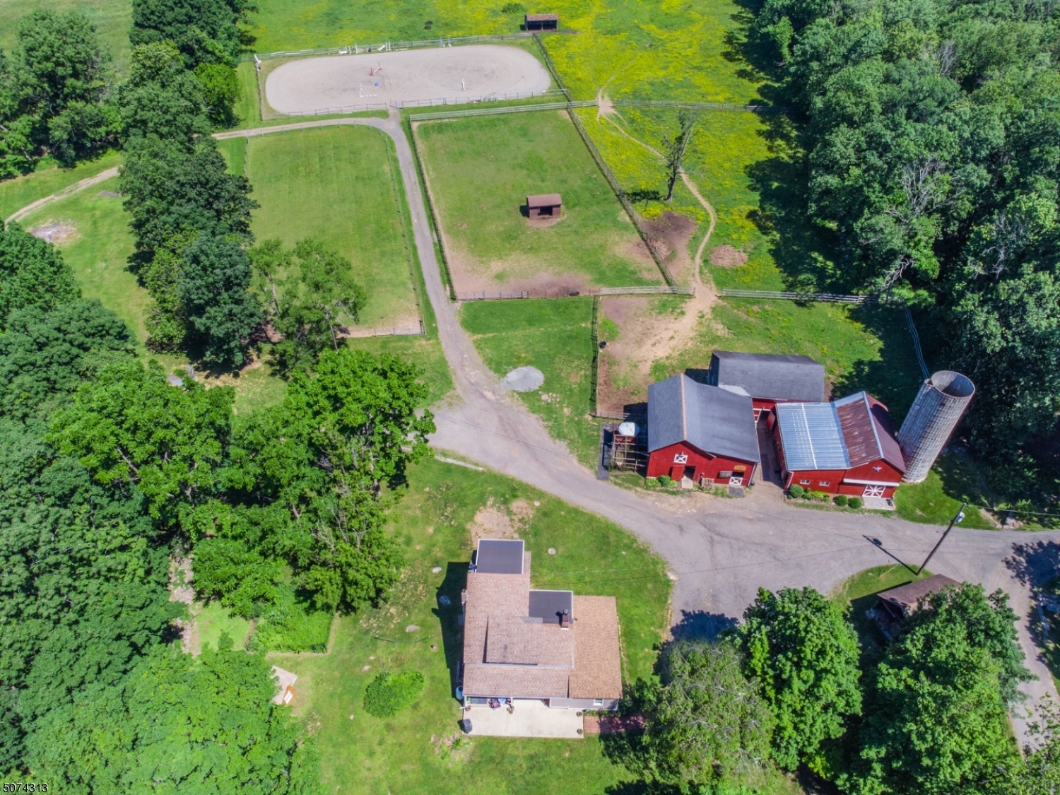 Turnkey Equestrian Facility with 46+ acres including 12 enclosed pastures, 5 acre cross country field, 12 acre hay field, hydrants to all fields. 17 total stalls w/tack rooms, feed rooms, lockers, wash stall, hot/cold water, washer/dryer, and 7 run-in sheds.  Beautiful 75 x125  indoor arena and 80 x200  outdoor ring. Charming and historical 3 bed/2 bath farmhouse with existing tenant, and 1 bed/1 bath updated cottage that could be rented out or used for residence. All surrounded by 230 acre land conservancy.6 Tax Records/3 Lots: BLOCK 13, Lot 10+Farm, Lot 10.01+Farm, Lot 11+Farm -acres and taxes reflect all combined total; also listed as land listing