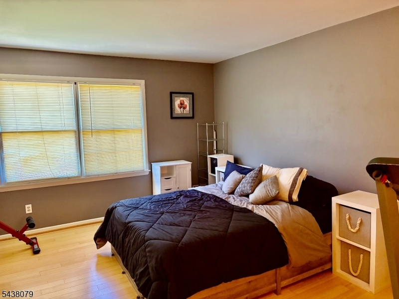 Located 2 short blocks from Main Street in the center of downtown, where you'll find a multitude of shops and restaurants as well as the train station with service to NYC. This community offers 2 off street parking spaces directly in front of the unit with a deck and large grass area behind each unit. Interior features include granite counters and hardwood floors on both levels. The full unfinished basement includes a laundry area and large storage area.