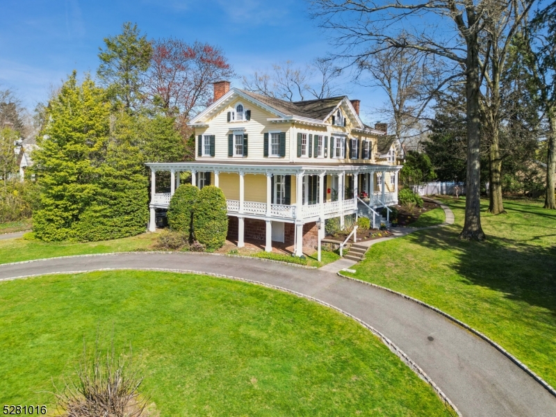 Location, Location!  This jewel in the heart of the prestigious Erwin Park estate section, spanning an entire block bet Valley Rd and Erwin Pk Rd, appx an acre of prime land, a RARE find!  With magnificent views of Edgemont Park once known as the Harrison's apple orchards. Situated on a sprawling lot of mature landscape, this iconic home offers luxury of space & allure of outdoor living. Your own private oasis and pool. The home retains its charm, elegance and architectural details with built-ins, Amazing windows Floor to ceiling, exquisite marble mantle FP, and impeccable hardwood Oak floors. Central Air - two zones, two-car attached garage with circular driveway. The  fabulous 3-sided porch with its "gingerbread railing" overlooking the park provide serenity and a place to relax and enjoy nature and the summer cool breeze. Property features Formal DR, with FP, Formal LR with FP, Den with FP, Library with FP, Office, Fam Rm, Large Eat-in Kit with eating area & FP. Kit has been updated with custom wood cabinetry and SS appliances. Primary BR Suite w/sitting rm and Primary Full bath w/shower. Second flr consists of an additional 5 BRs, 2 BA. The rear section of the home is separate from the main house and is perfect for nanny quarters, or long term guests. Updates have been made throughout the yrs. Super close to NYC direct train & Watchung Plaza. What's not to LOVE!,