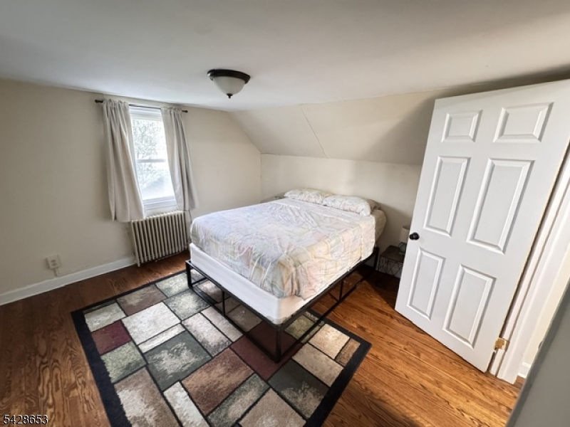 Charming Cape Cod-style home located on a quiet street in the heart of Newton. This 4-bedroom, 2-bath property features a versatile den and beautiful hardwood floors throughout. With great bones and plenty of character, this home is ready for your personal vision and finishing touches. Enjoy a spacious backyard perfect for entertaining, summer barbecues, or relaxing outdoors. A wonderful opportunity to create your dream home in a desirable location. Property is being sold as-is. Don't miss out!